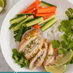 Pinterest pin with text overlay "Vietnamese Lemongrass Chicken Vermicelli Bowls", image of a white bowl filled with vermicelli noodles, lemongrass chicken, vegetables, and nuoc cham.