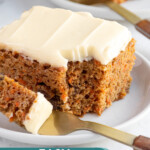 Pinterest pin with text overlay "Easy Homemade Carrot Cake", image of a slice of orange spiced carrot cake with cream cheese frosting on a plate.