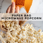 Pinterest pin with text overlay "Paper Bag Microwave Popcorn", image of a brown bag rolled up and popcorn tumbling out onto a tabletop.