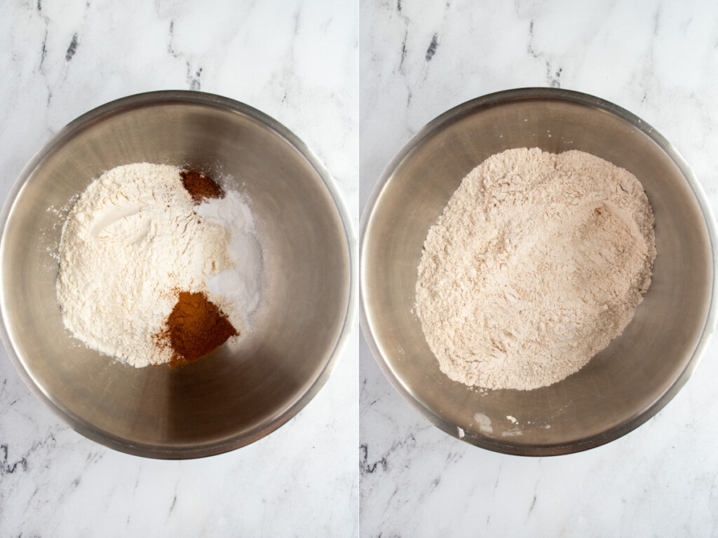 A stainless steel bowl with the dry ingredients for making carrot cake and mixed together.