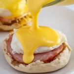 Pinterest pin with logo overlay "The Schmidty Wife", image of easy hollandaise sauce poured over eggs Benedict.