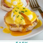 Pinterest pin with text overlay "Easy Eggs Benedict", image of eggs Benedict on a white plate.
