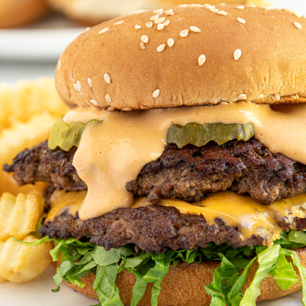 A double burger dripping with homemade Big Mac sauce.