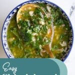 Pinterest pin with text overlay "Easy Chimichurri", image of chimichurri being spooned onto grilled meat.