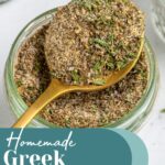 Pinterest Pin with text overlay "Homemade Greek Seasoning", image of a jar with a resting spoon full of greek seasoning.