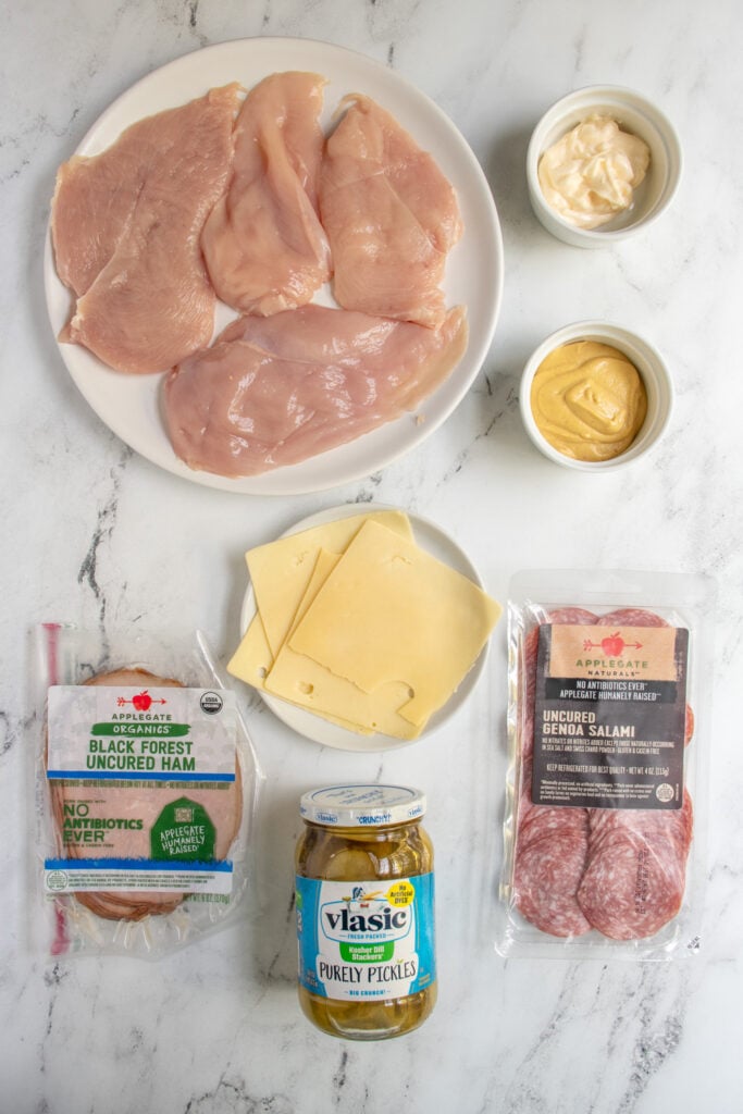 Ingredients for cubano chicken bake laid out on a tabletop.