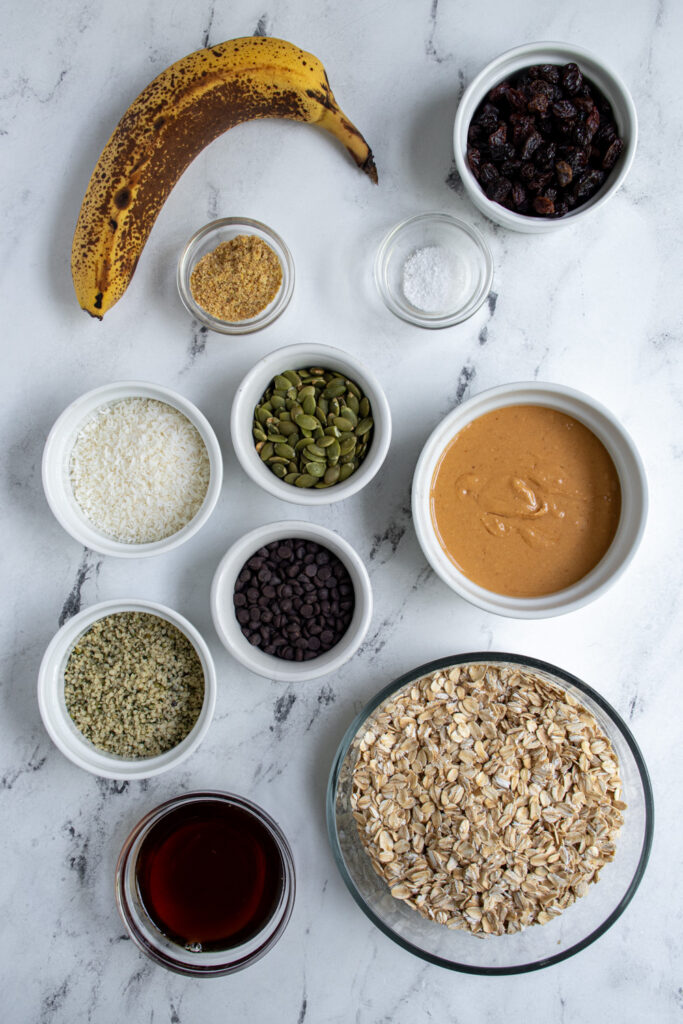 Ingredients needed to make healthy breakfast cookies sitting on a tabletop.