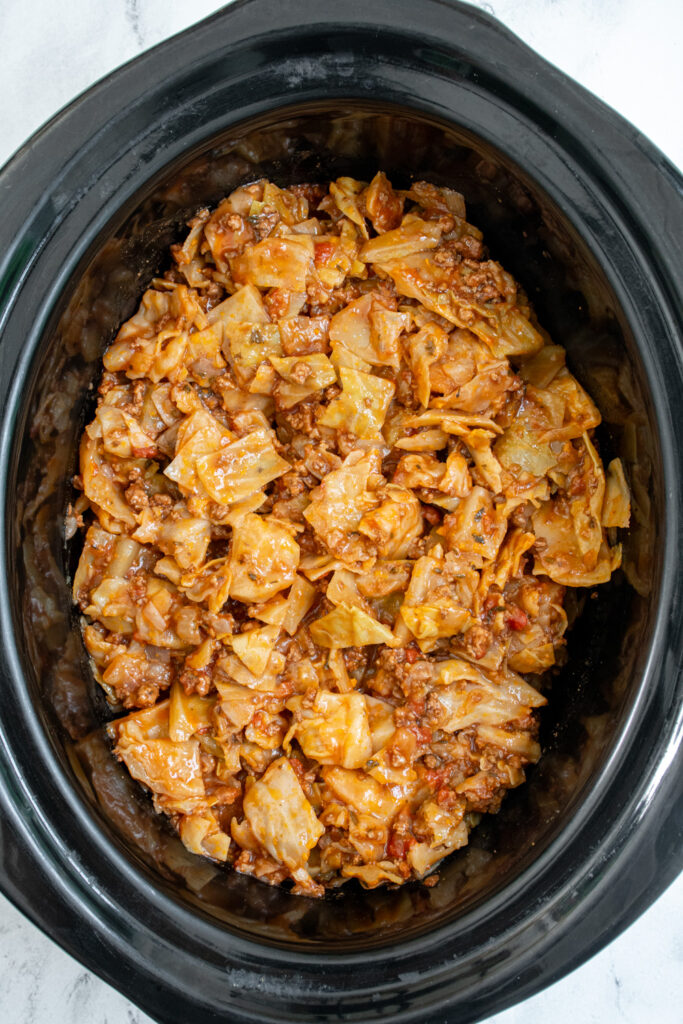 Overhead view of freshly cooked slow cooker lazy cabbage rolls.