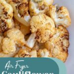 Pinterest pin with text overlay "Air Fryer Cauliflower", image of a bowl of crispy cauliflower roasted in the air fryer.