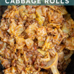Pinterest pin with text overlay "Slow Cooker Unstuffed Cabbage Rolls", image of crockpot with cooked lazy cabbage rolls.