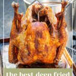 Pinterest pin with text overlay 'The Best Deep Fried Turkey Recipe', image of a golden brown deep fried turkey.