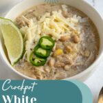 Pinterest pin with text overlay "Crockpot White Chicken Chili", image of a white bowl filled with white chicken chili garnished with sharp white cheddar.