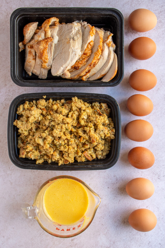 All of the ingredients to make leftover thanksgiving eggs benedict laid out on a table top.