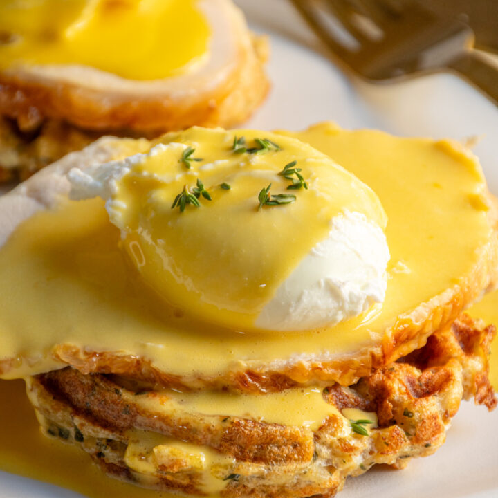 Leftover Thanksgiving Eggs Benedict with a stuffing waffle, turkey, poached egg, and hollandaise sauce.