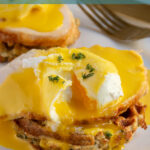 Pinterest pin with text overlay "Leftover Thanksgiving Eggs Benedict", image of a poached egg opened with runny yolk with hollandaise sauce, turkey, and a stuffing waffle.