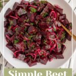 Pinterest pin with text overlay 'Simple Beet Salad', image of a serving bowl filled with beet salad topped with fresh dill.
