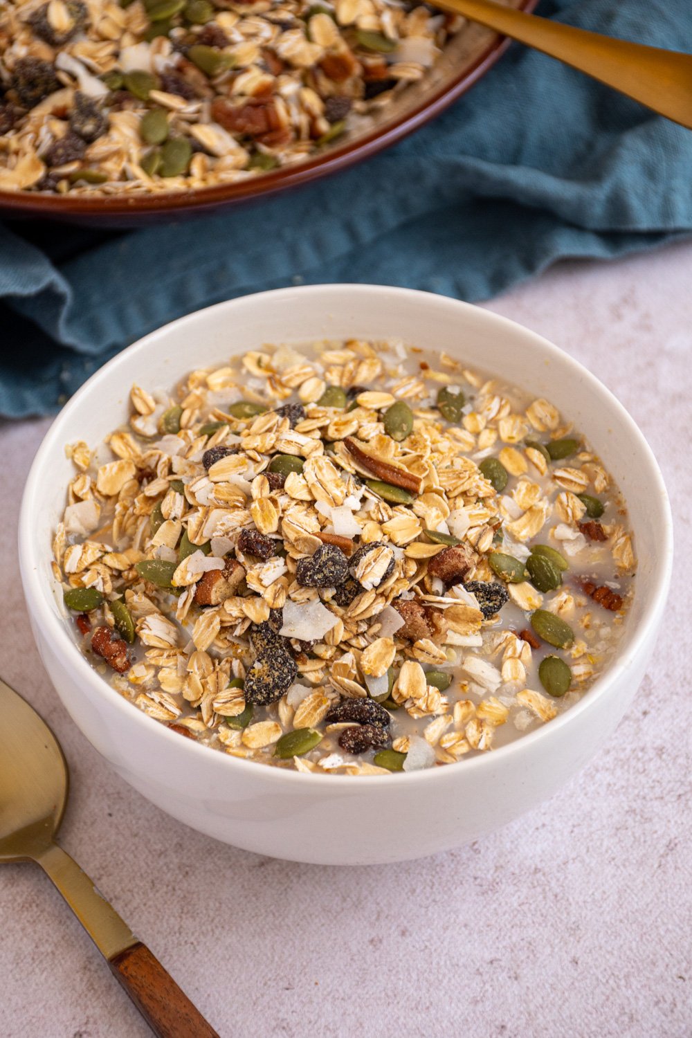 Muesli recipe in a bowl with oat milk.