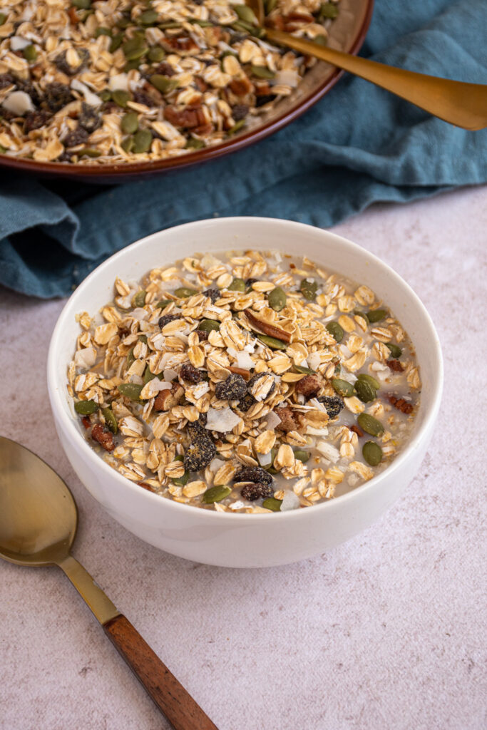 Homemade Muesli in a bowl with oat milk.