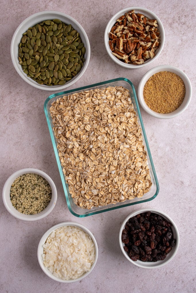 Ingredients needed to make a muesli recipe laid out on a tabletop top!