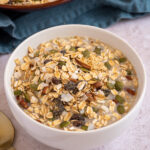 Pinterest pin with text overlay 'Muesli Recipe', image of a bowl with homemade muesli.