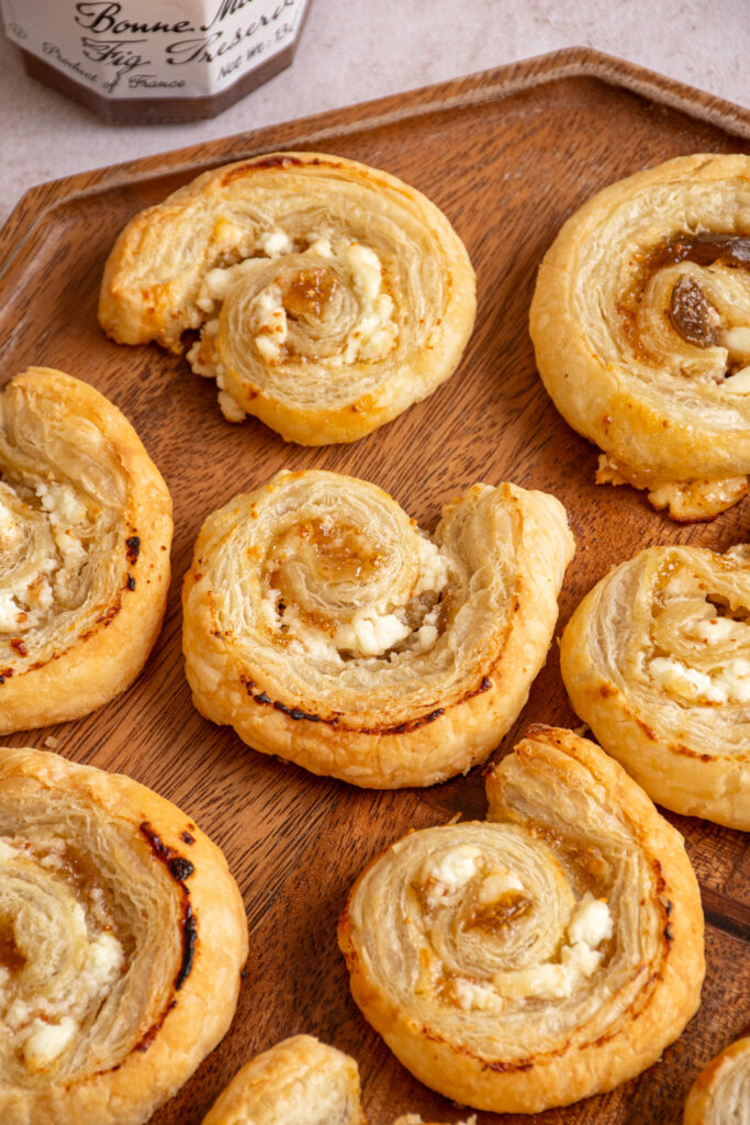 A tray filled with Fig and Goat Cheese Puff Pastry Pinwheels.