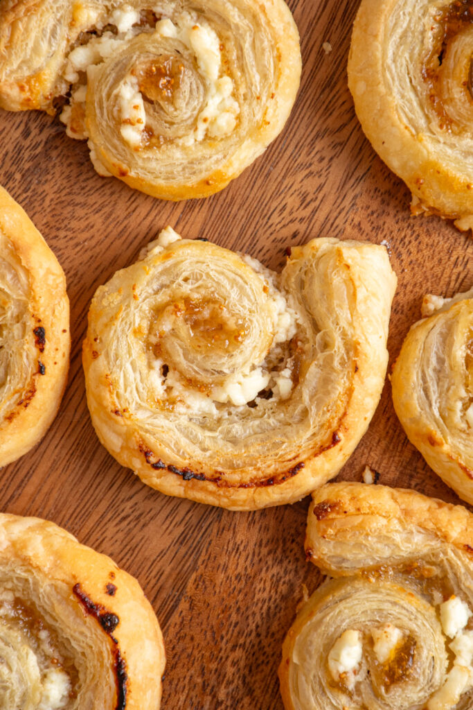 A close up of a Fig and Goat Cheese Puff Pastry Pinwheel.