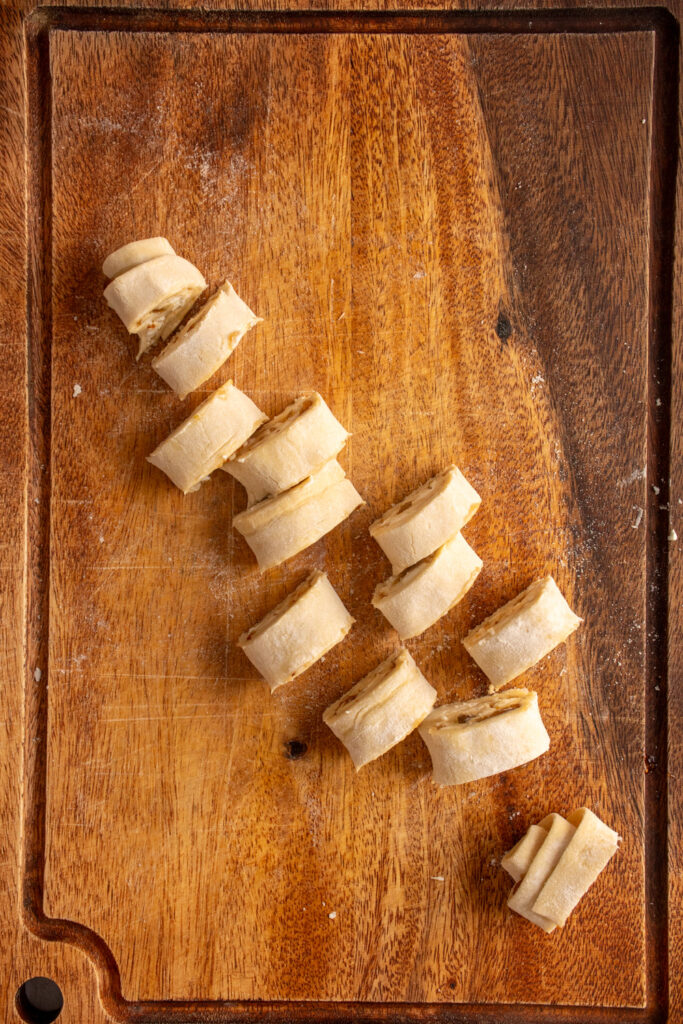 Sliced unbaked Fig and Goat Cheese Puff Pastry Pinwheels.