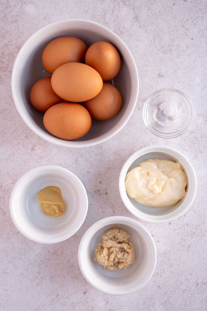 Ingredients to make horseradish deviled eggs.