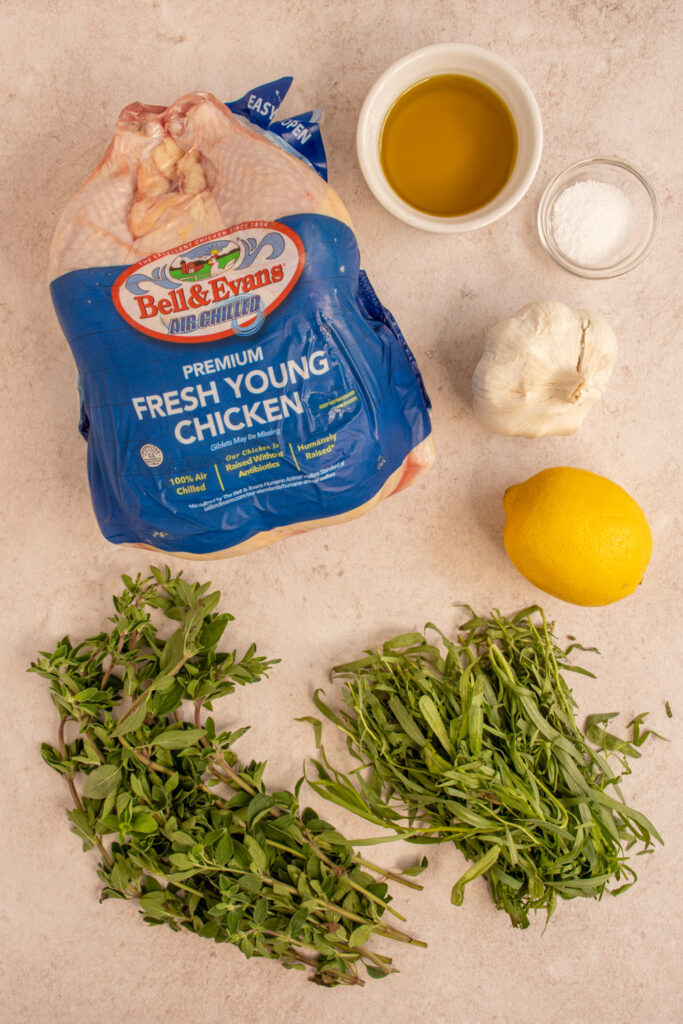 The ingredients needed to make a spatchcock roasted chicken.