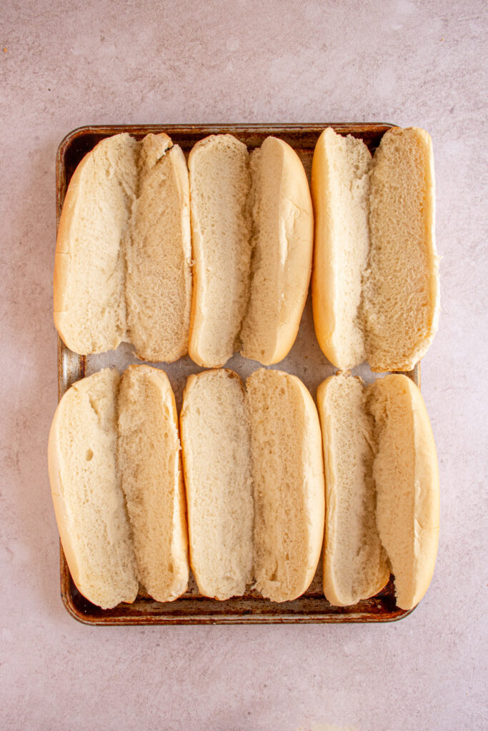 A sheet pan with open sub rolls.