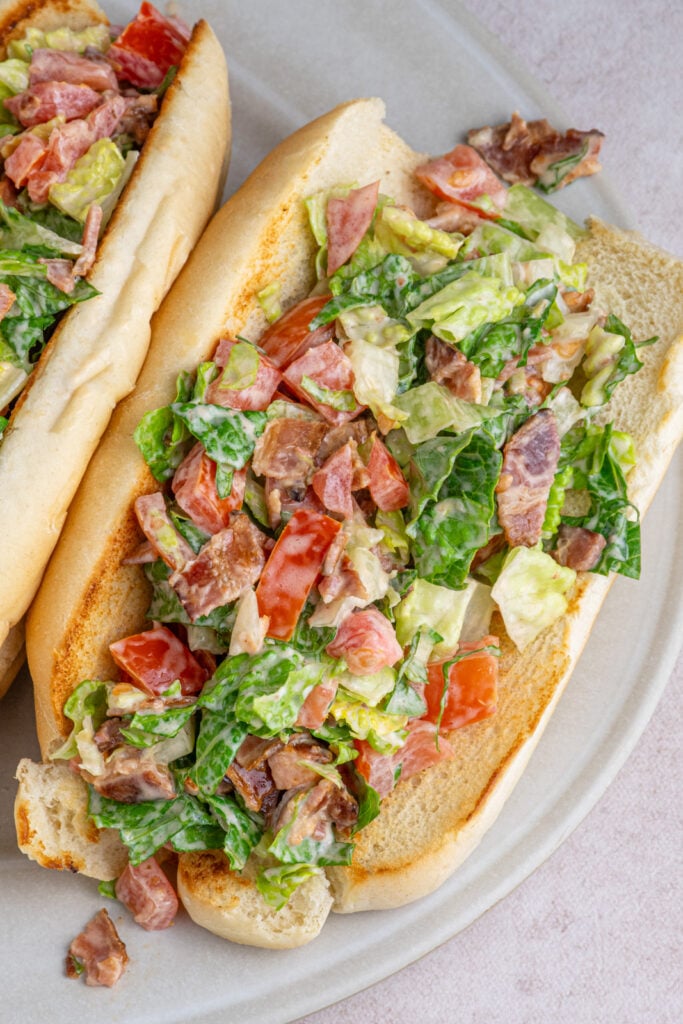 A chopped BLT sandwich on a serving platter.