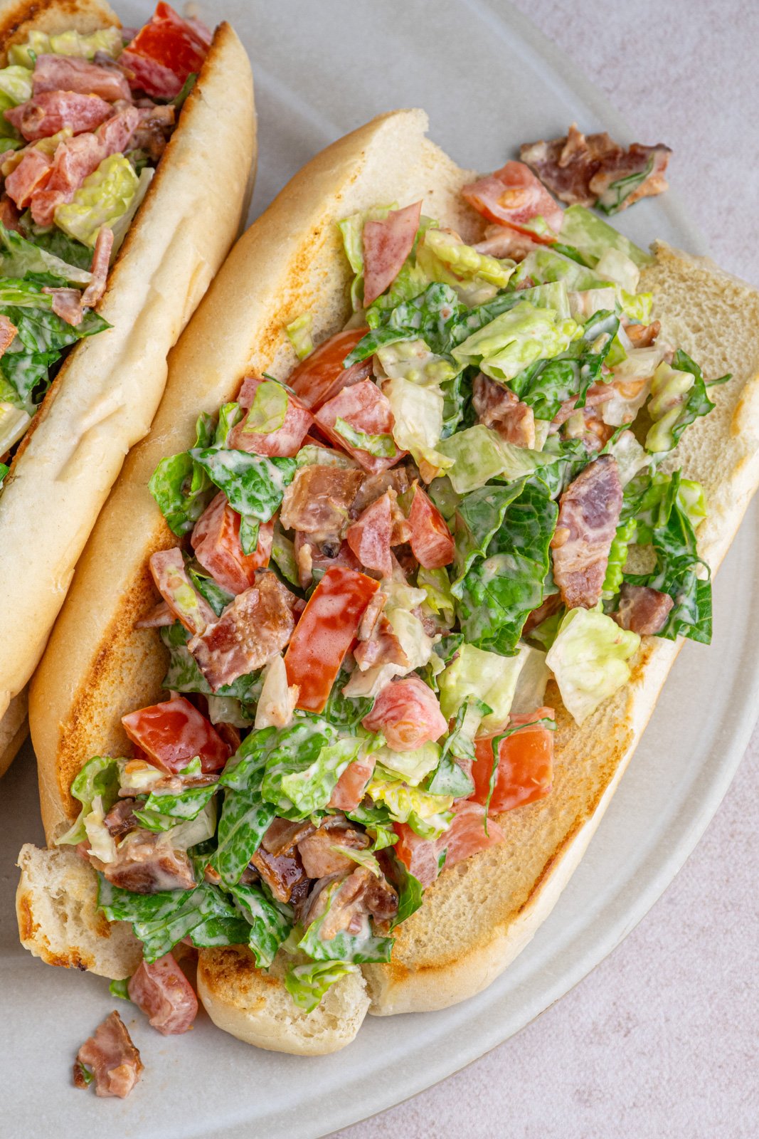 A chopped BLT sandwich on a serving platter.