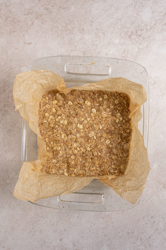 The crust for the fig oat bars pressed down into the pan.