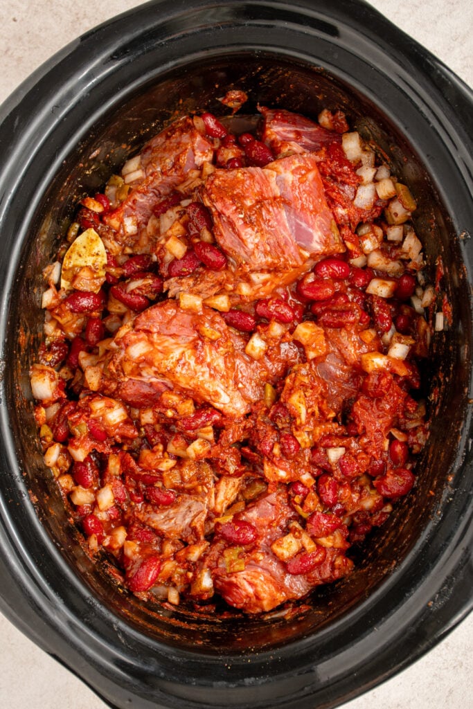All the ingredients mixed together in the crockpot before cooking.