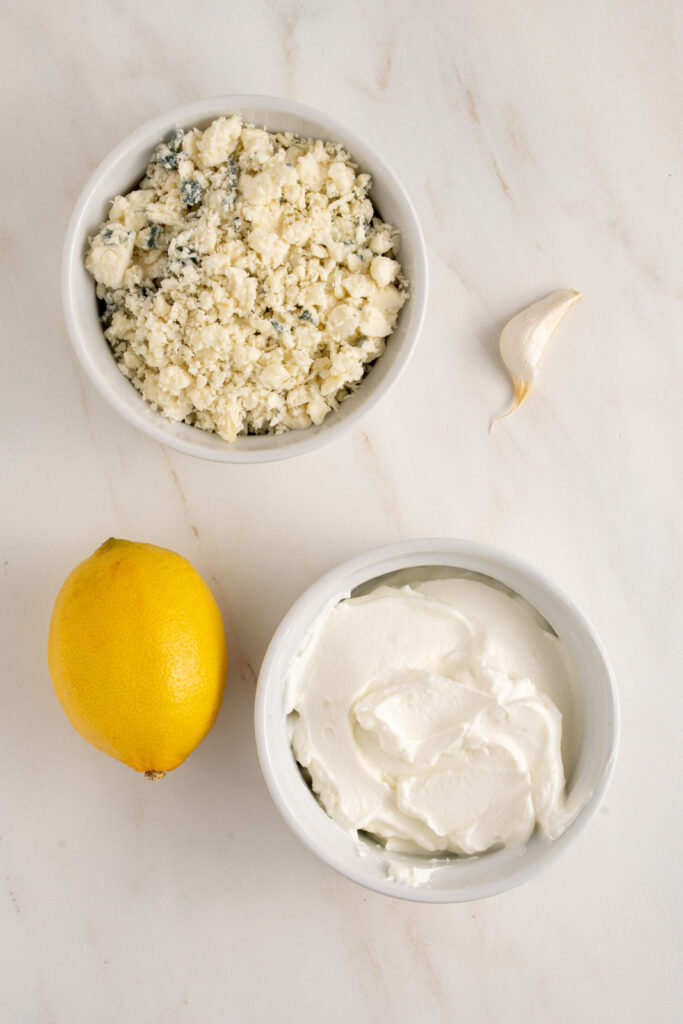 Ingredients for making blue cheese greek yogurt dip.