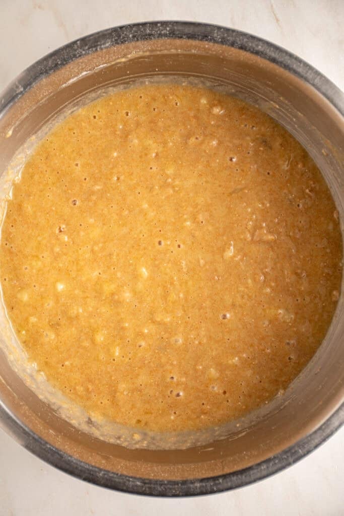 A bowl full of batter for whole wheat banana muffins.